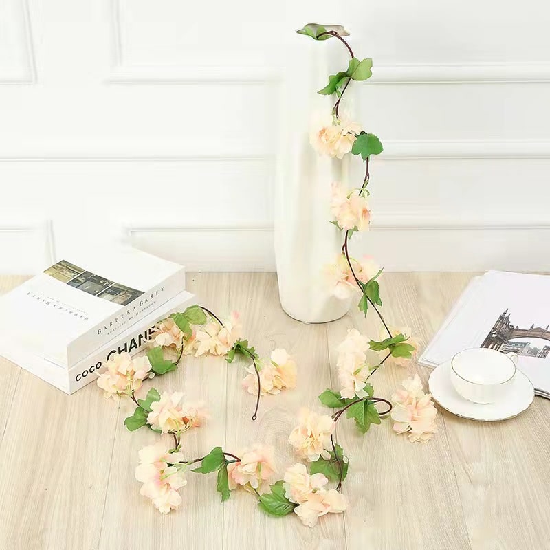 Guirlande de fleurs de cerisier et feuilles artificielles Guirlande de fleurs de cerisier et feuilles artificielles